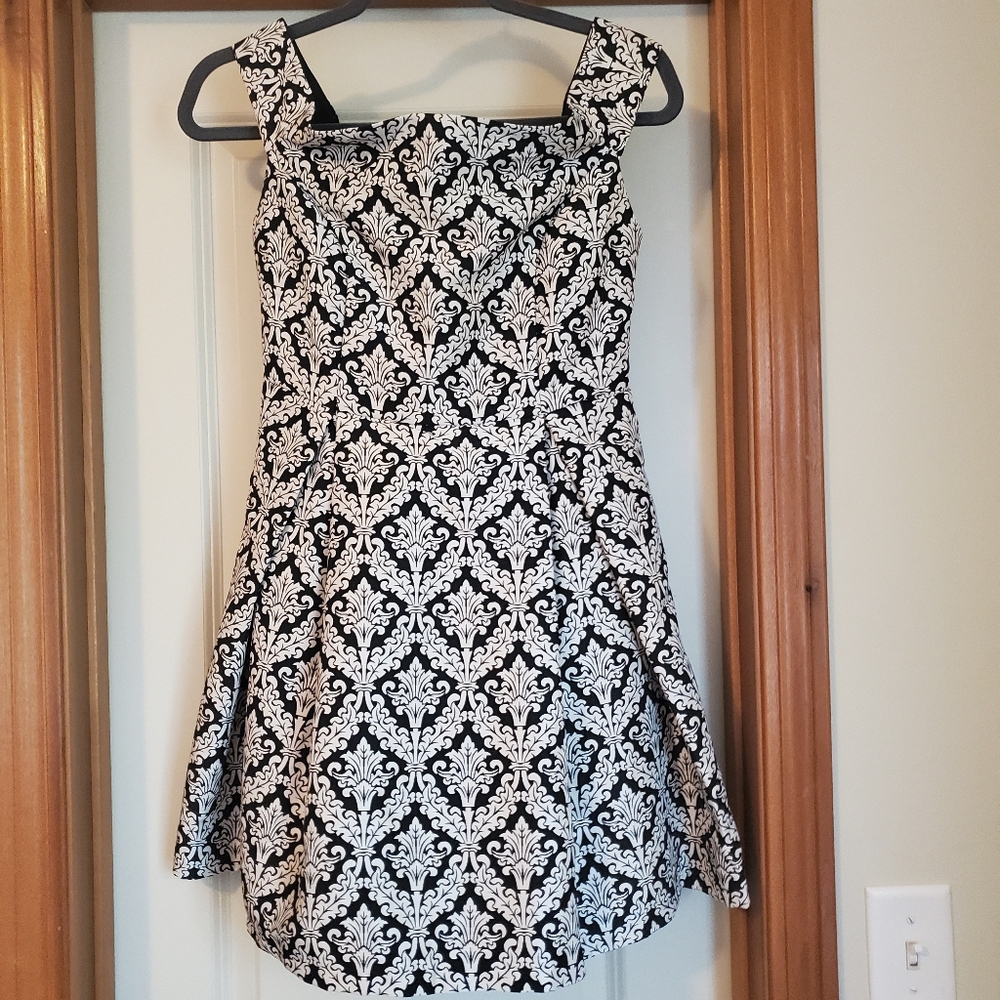Off the shoulder, just above knee